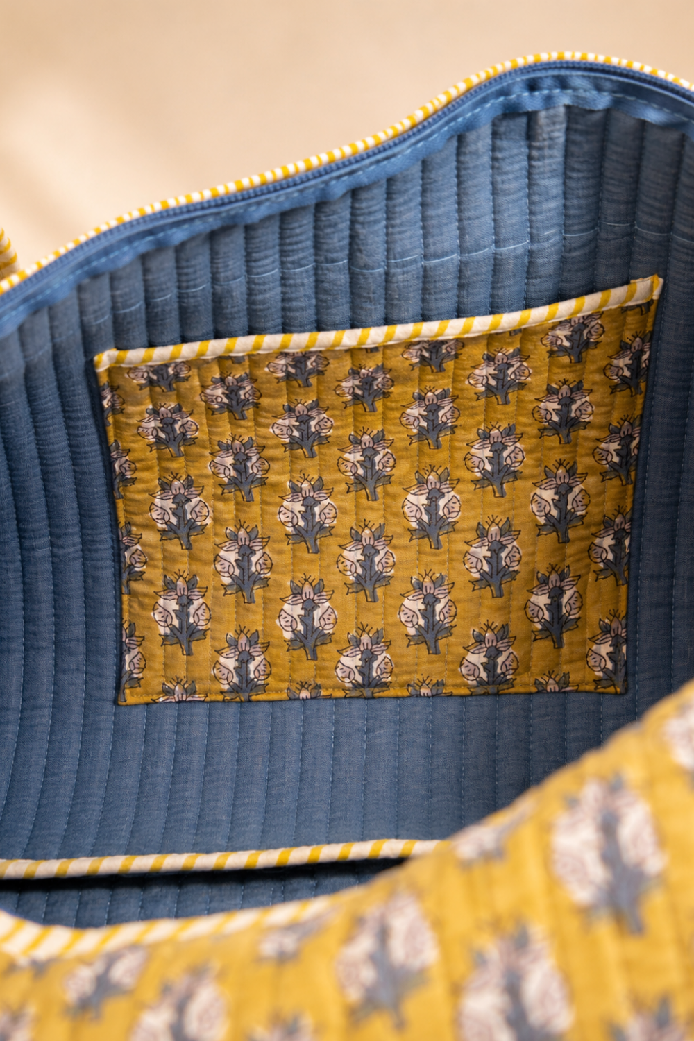 Marigold Trail Quilted Handblock Printed Cotton Duffle Bag